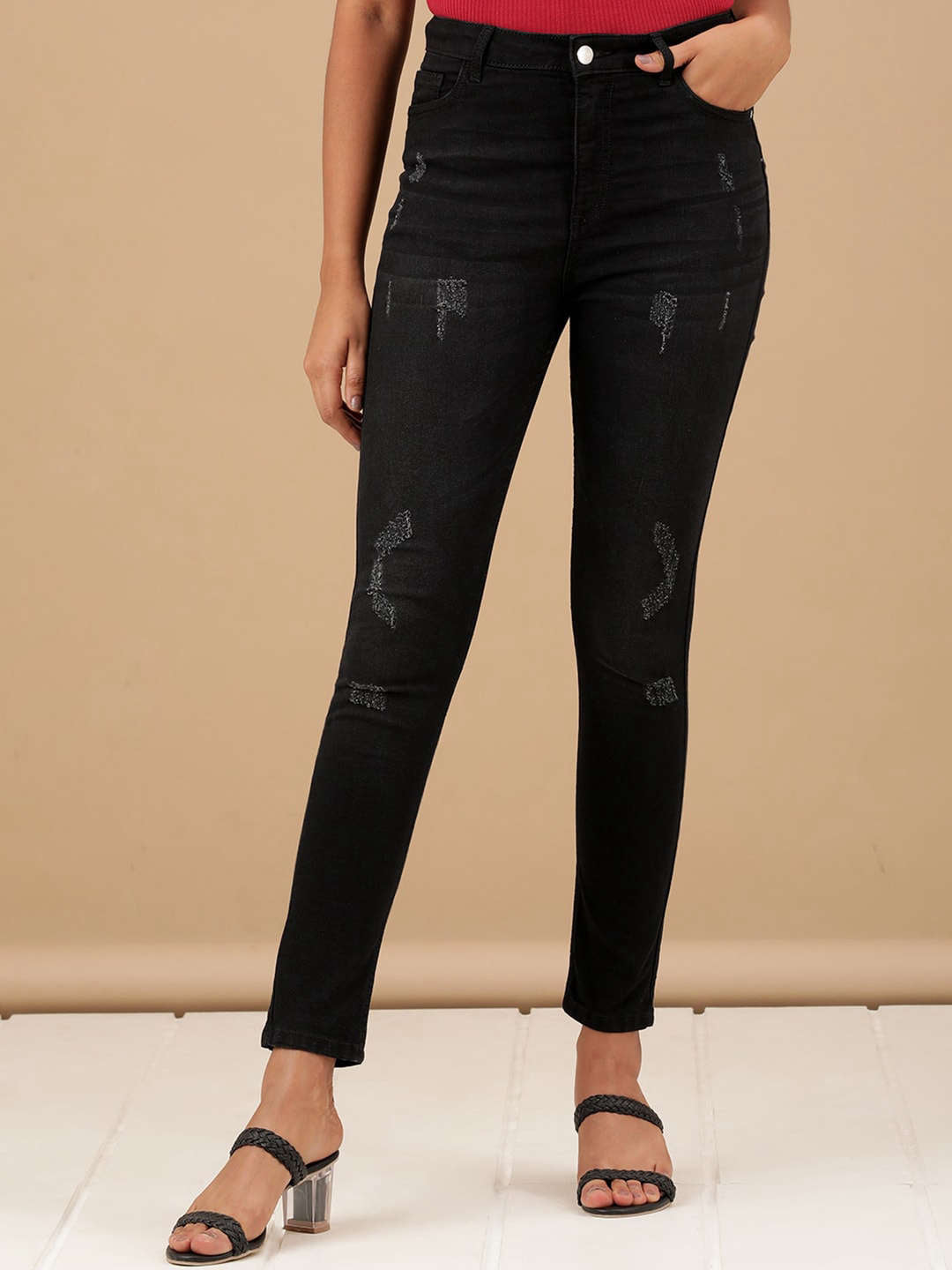 Shop Women Distressed Slim Fit Jeans Online.