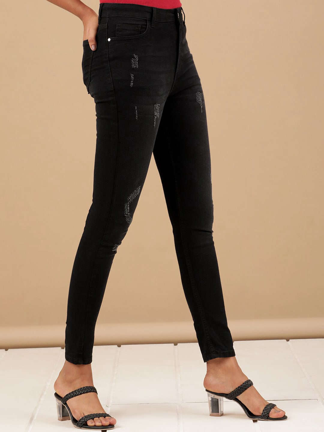 Shop Women Distressed Slim Fit Jeans Online.