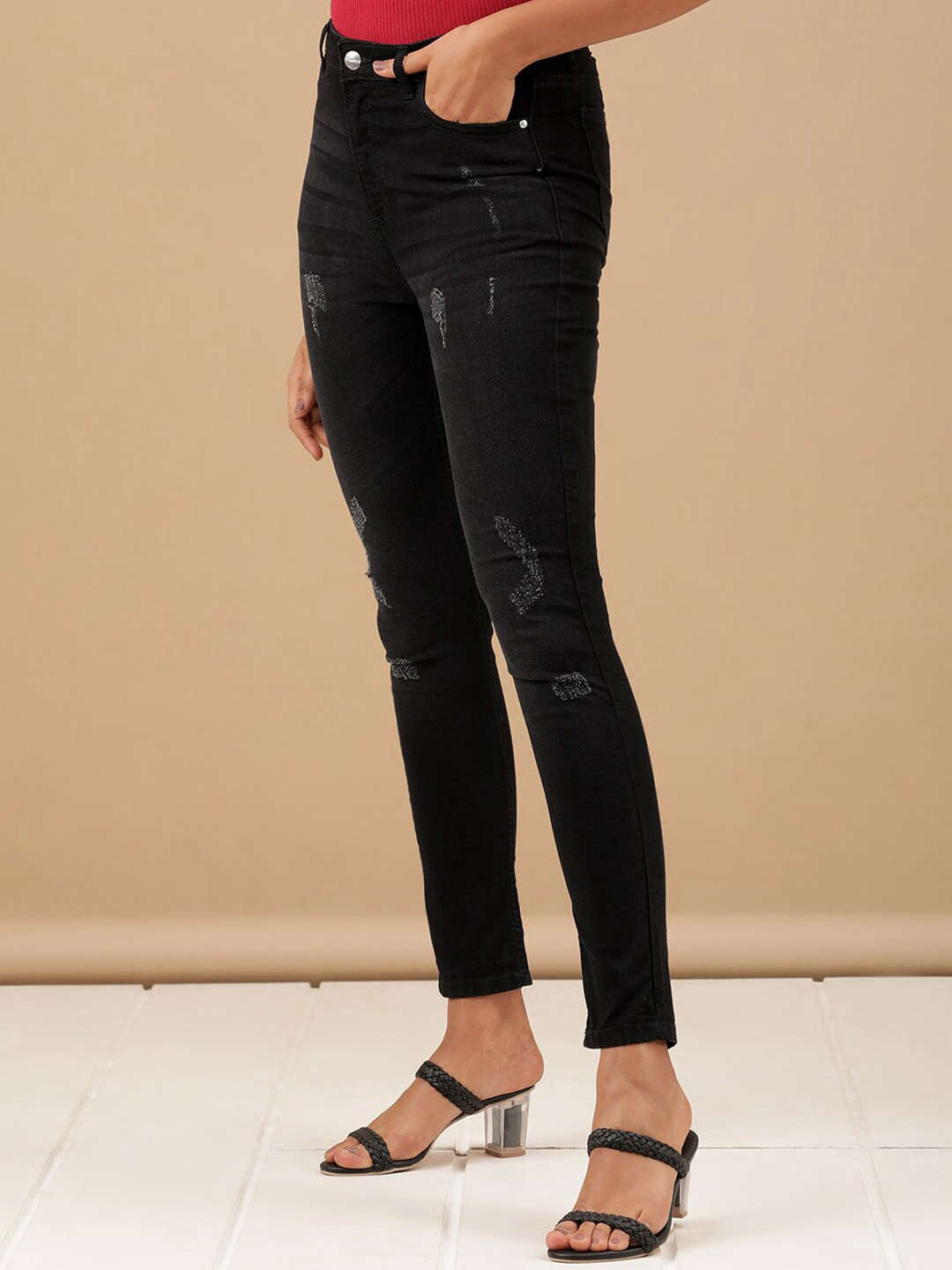 Shop Women Distressed Slim Fit Jeans Online.