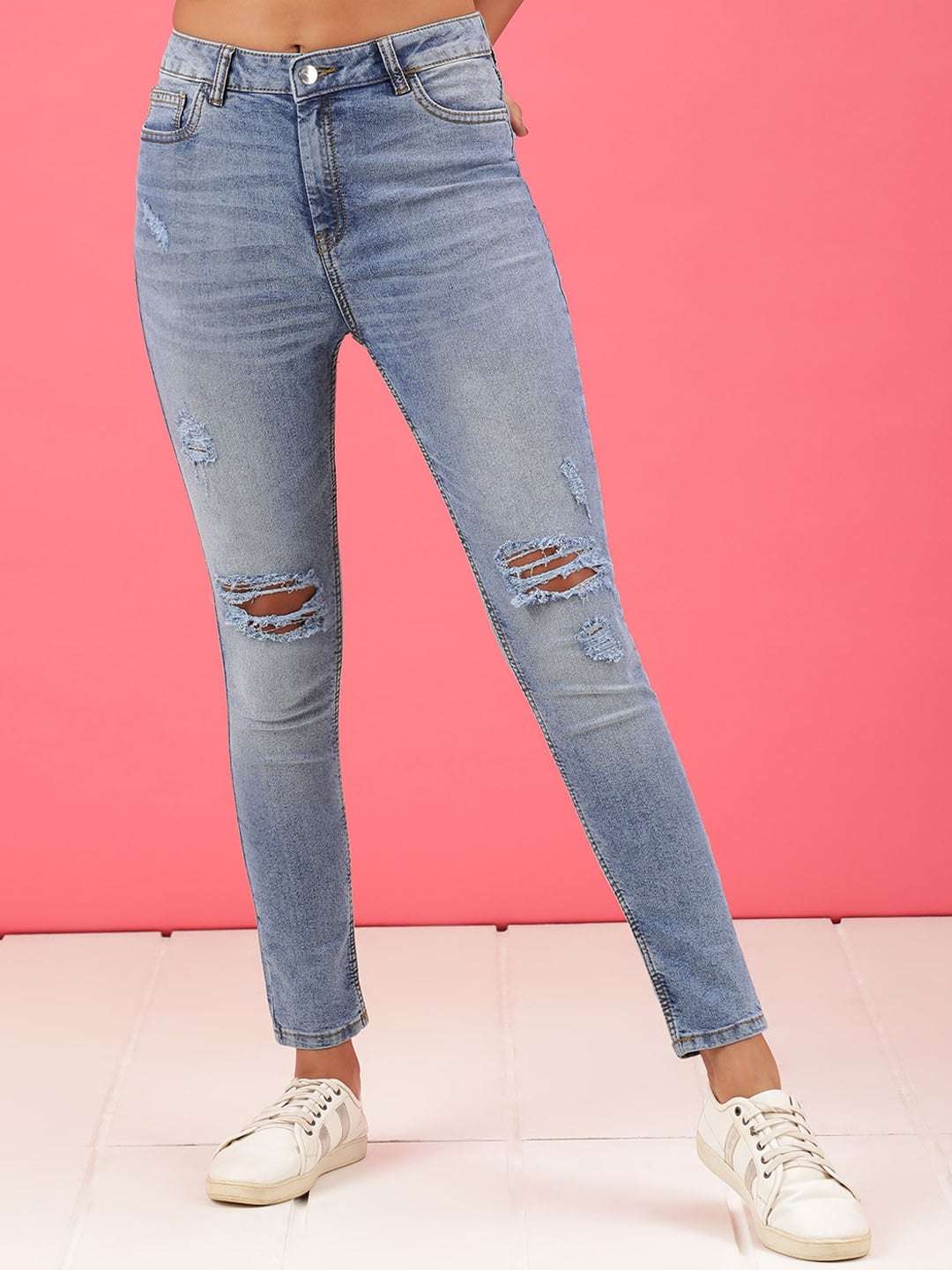 Shop Women Distressed Slim Fit Jeans Online.