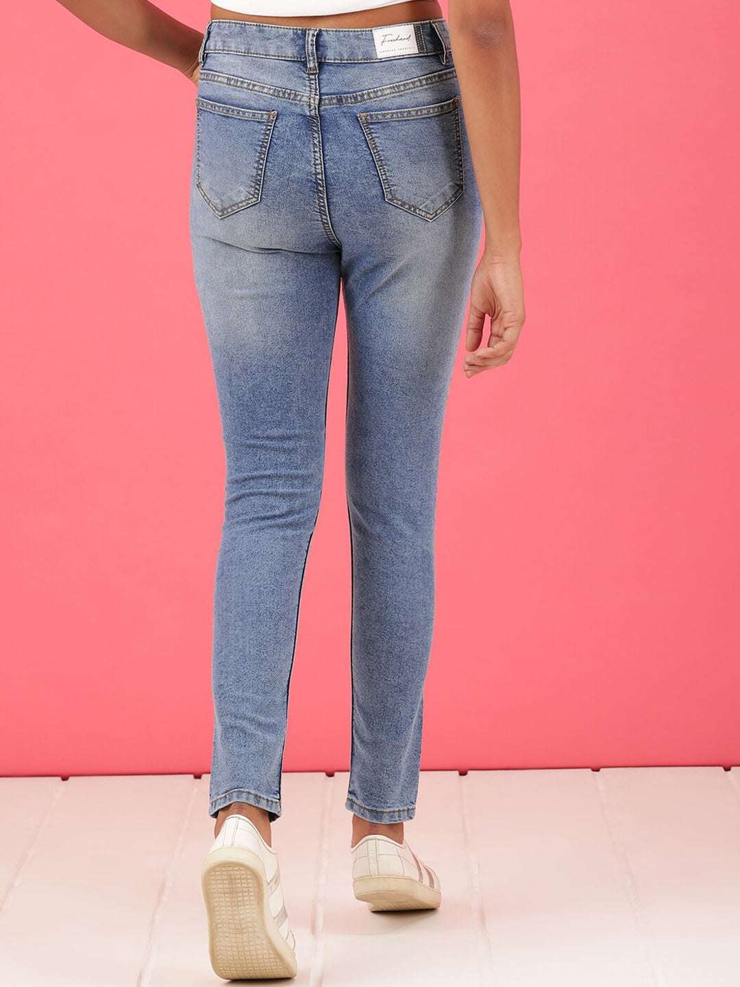 Shop Women Distressed Slim Fit Jeans Online.