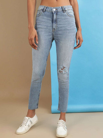 Shop Women Distressed Slim Fit Jeans Online.