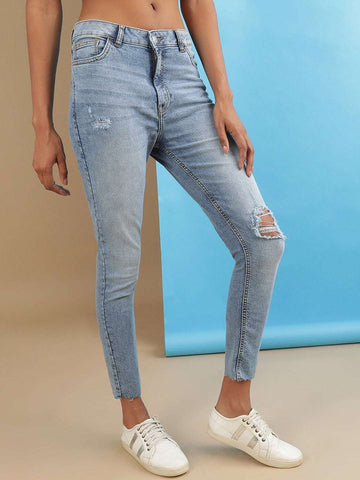 Shop Women Distressed Slim Fit Jeans Online.