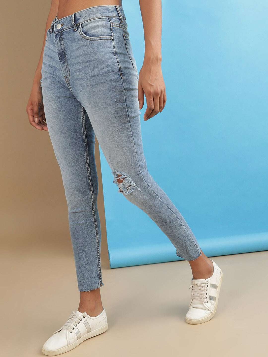 Shop Women Distressed Slim Fit Jeans Online.