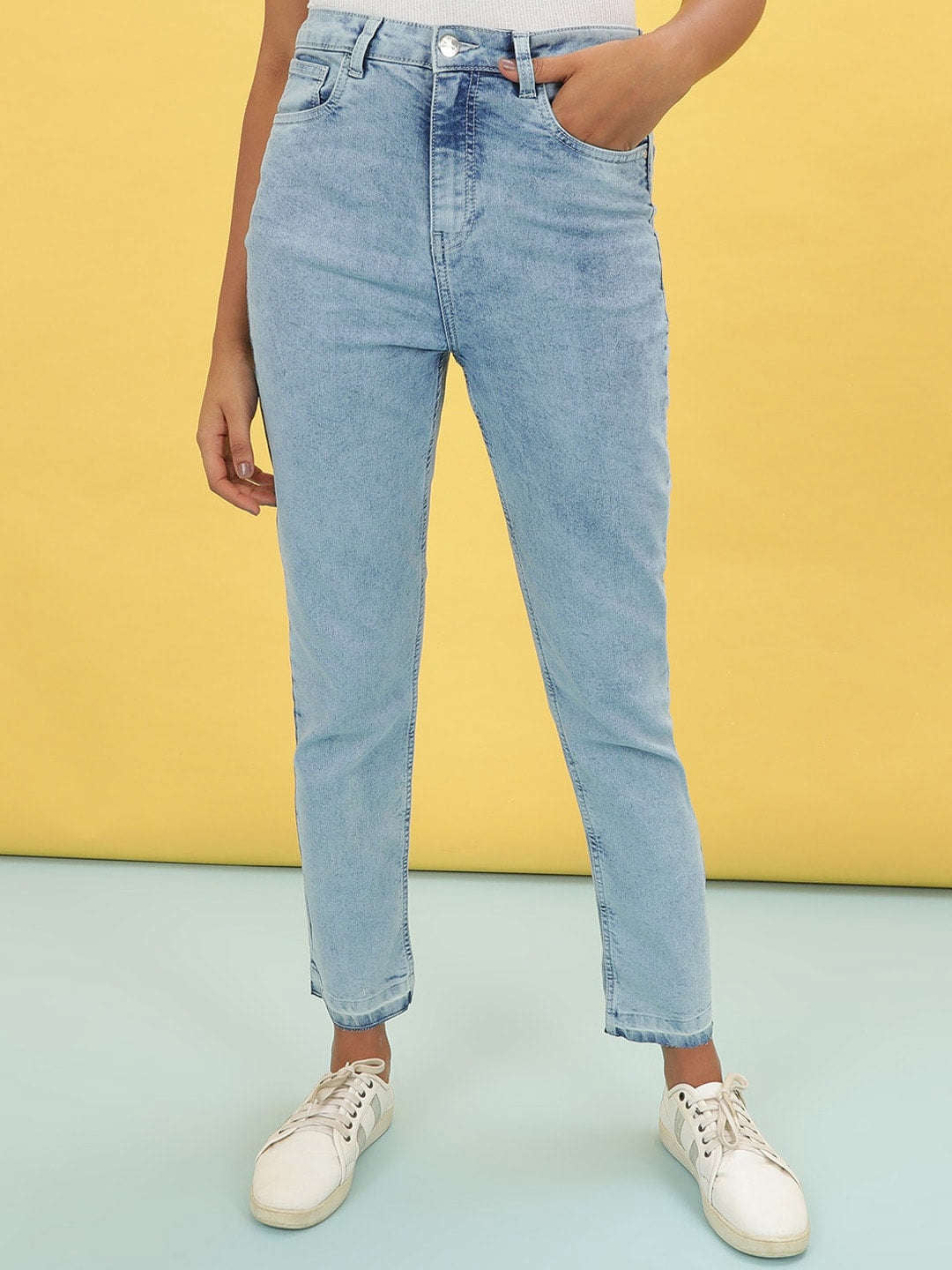 Shop Women Light Wash Straight Fit Denim Jeans Online.