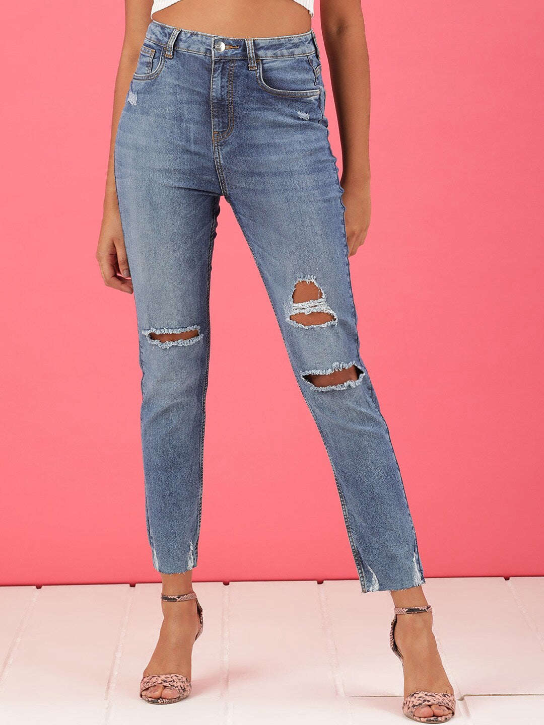 Shop Women Distressed Straight Fit Jeans Online.