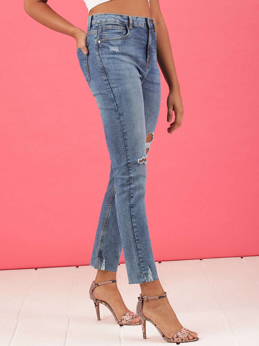 Shop Women Distressed Straight Fit Jeans Online.