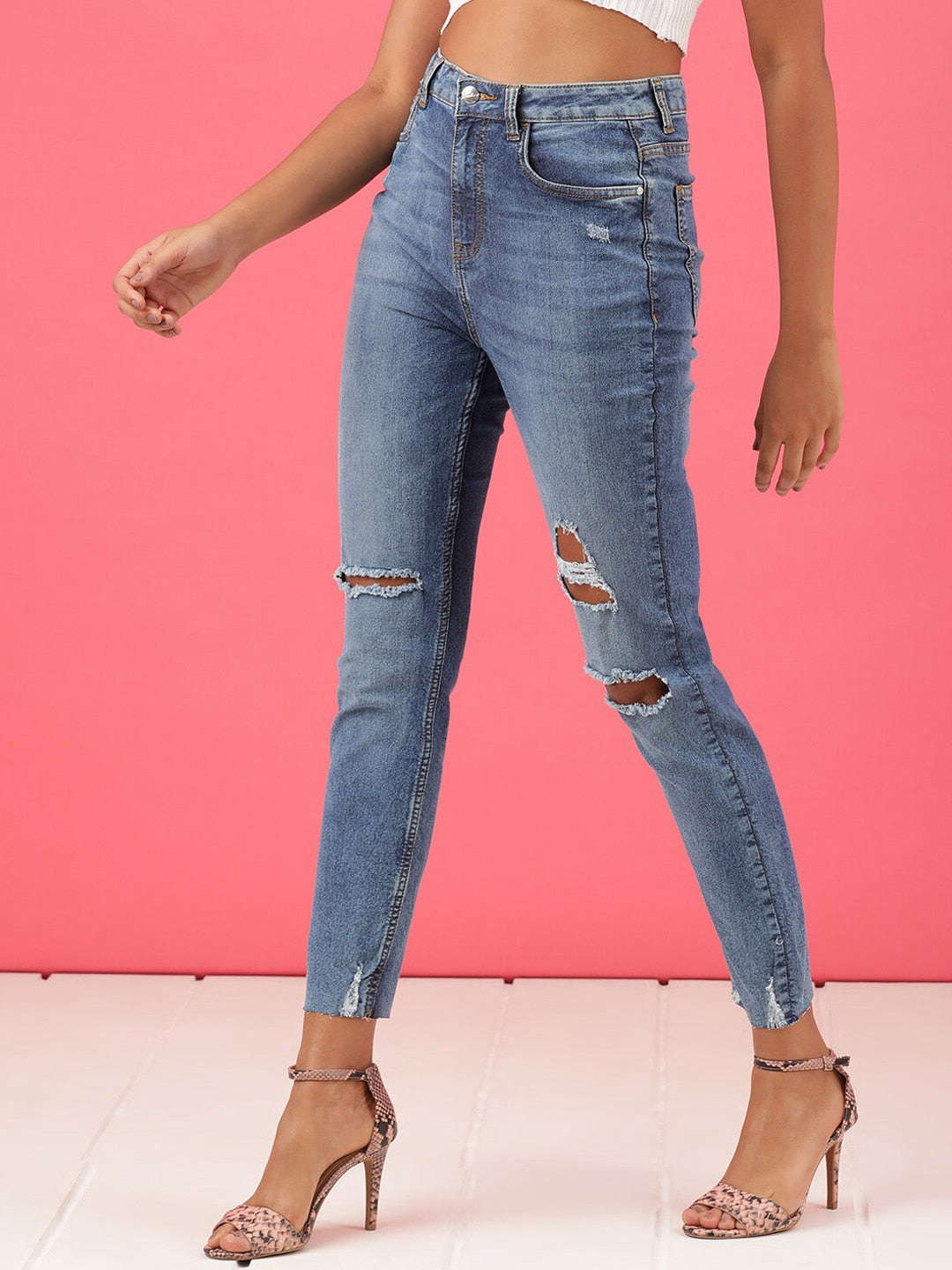 Shop Women Distressed Straight Fit Jeans Online.