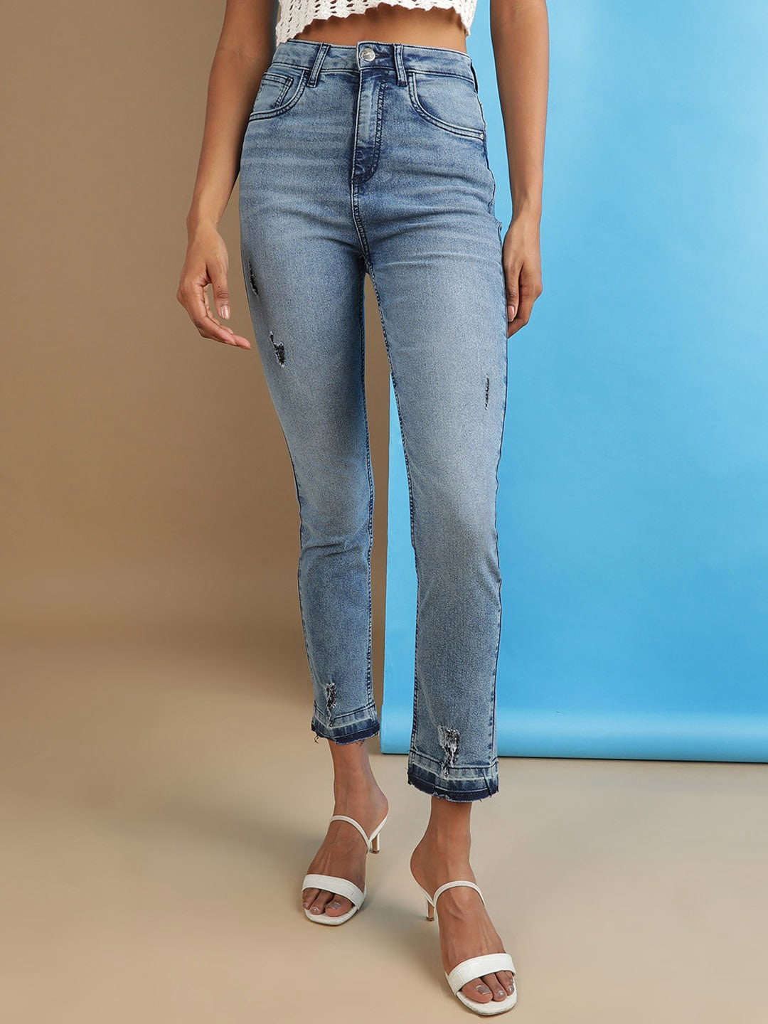 Shop Women Mid Wash Straight Fit Denim Jeans Online.