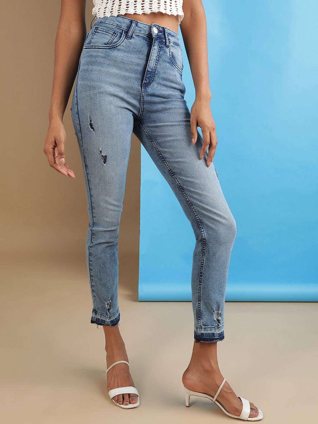 Shop Women Mid Wash Straight Fit Denim Jeans Online.