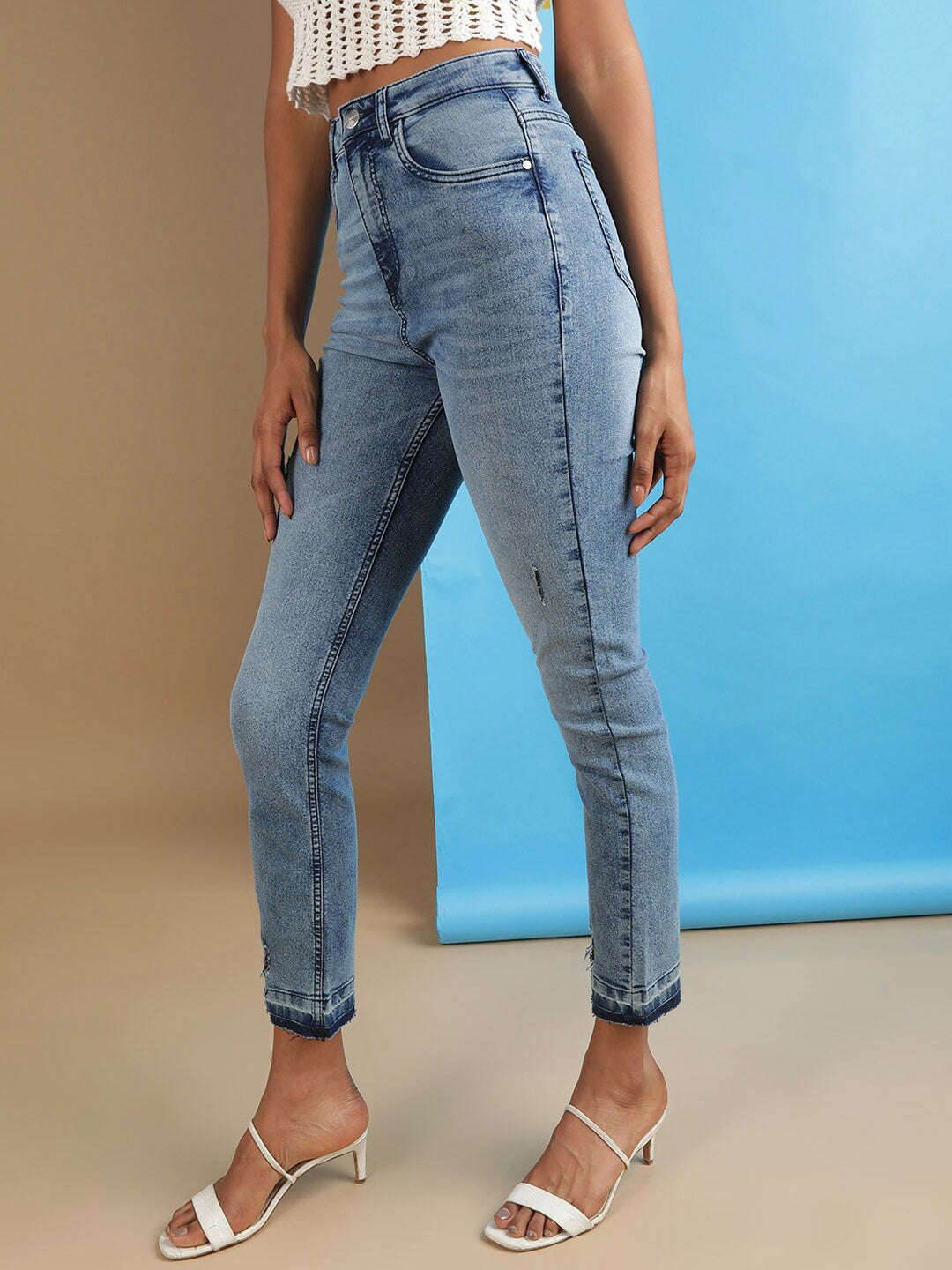 Shop Women Mid Wash Straight Fit Denim Jeans Online.