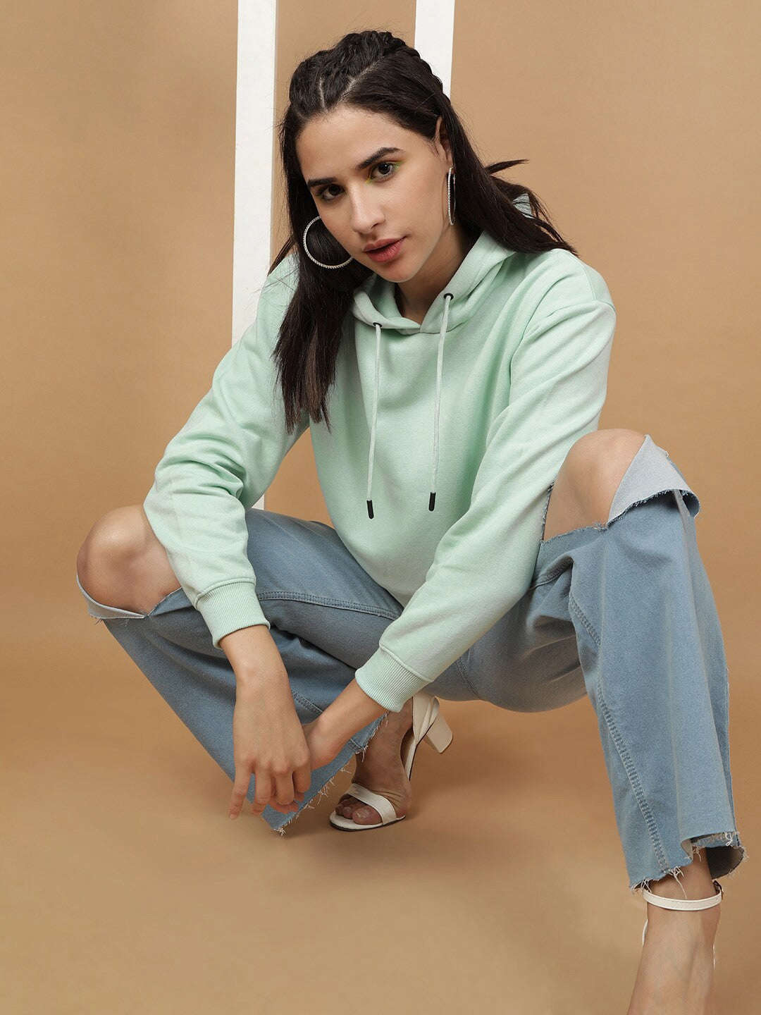 Shop Women's Solid Regular Fit Sweatshirt Online.