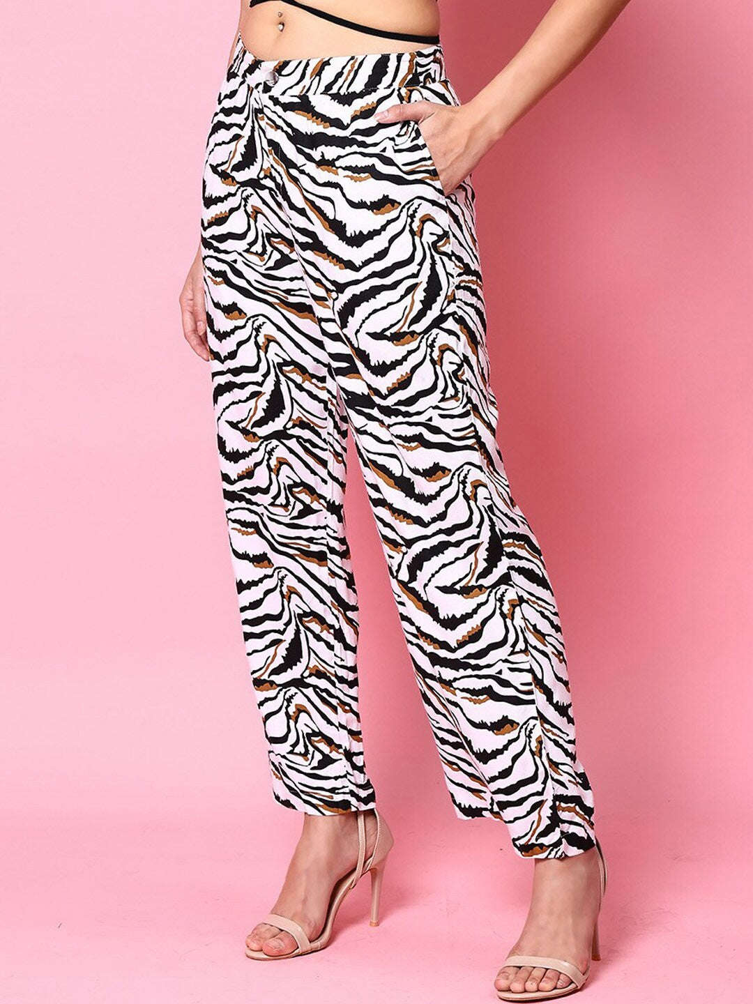 Shop Women Animal Printed Flare Pant Online.