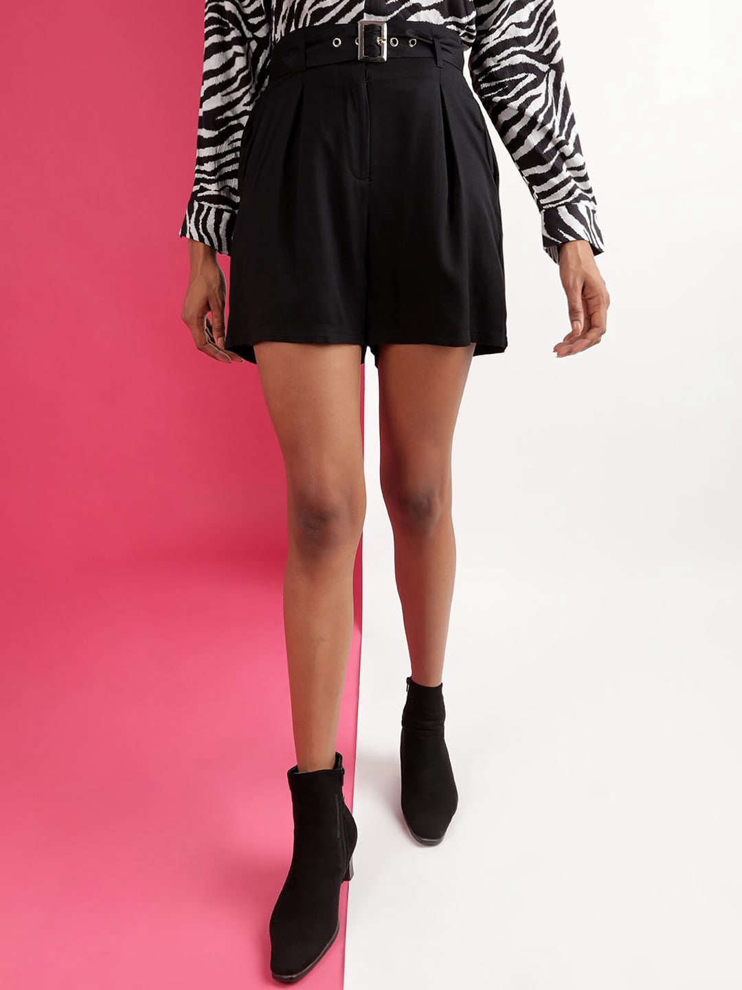 Shop Women Solid Belted Shorts Online.