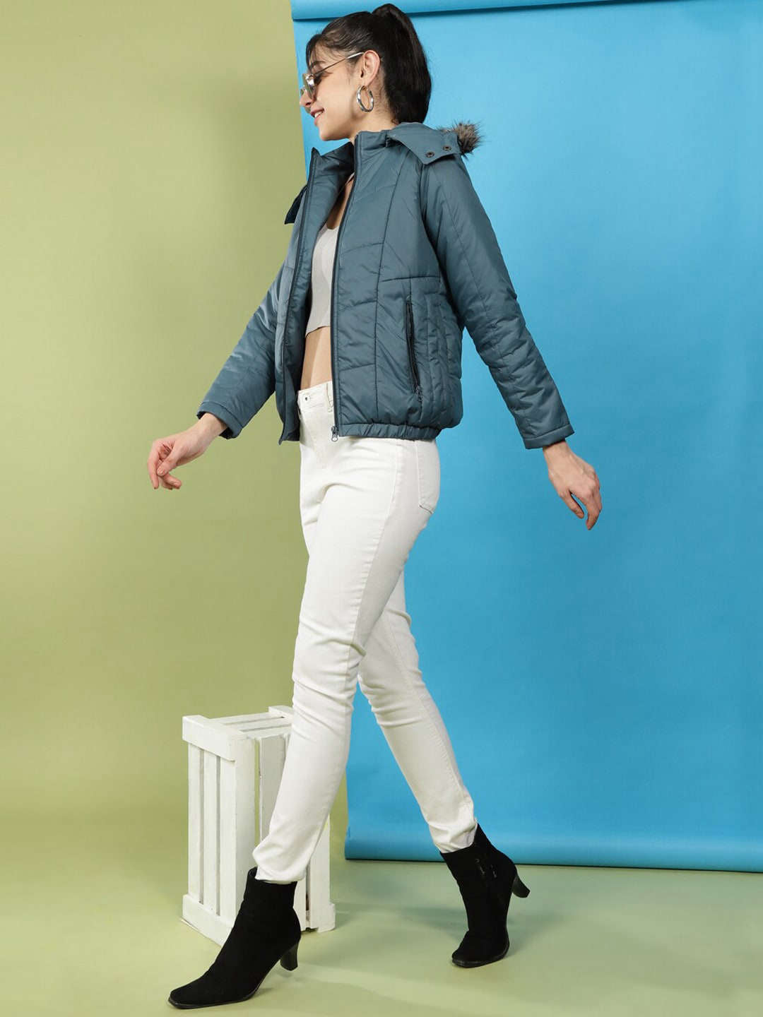 Shop Women Quilted Hooded Jacket With Faux Fur Online.