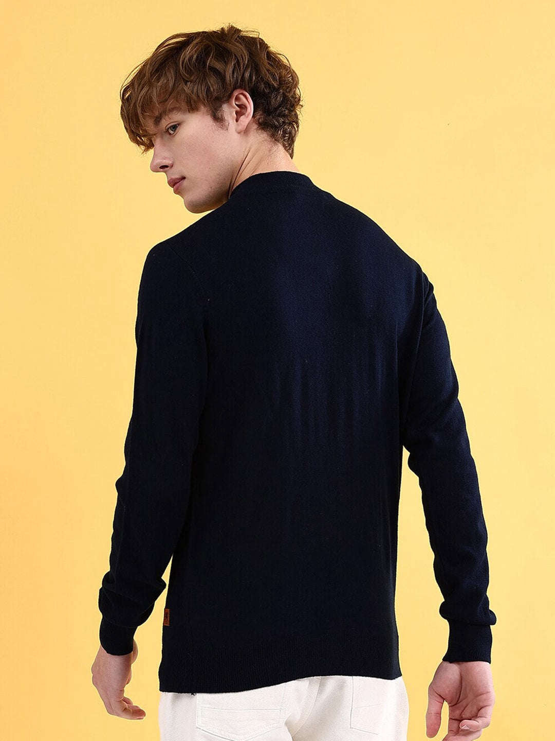 Shop Men's Solid Regular Fit Sweater Online.