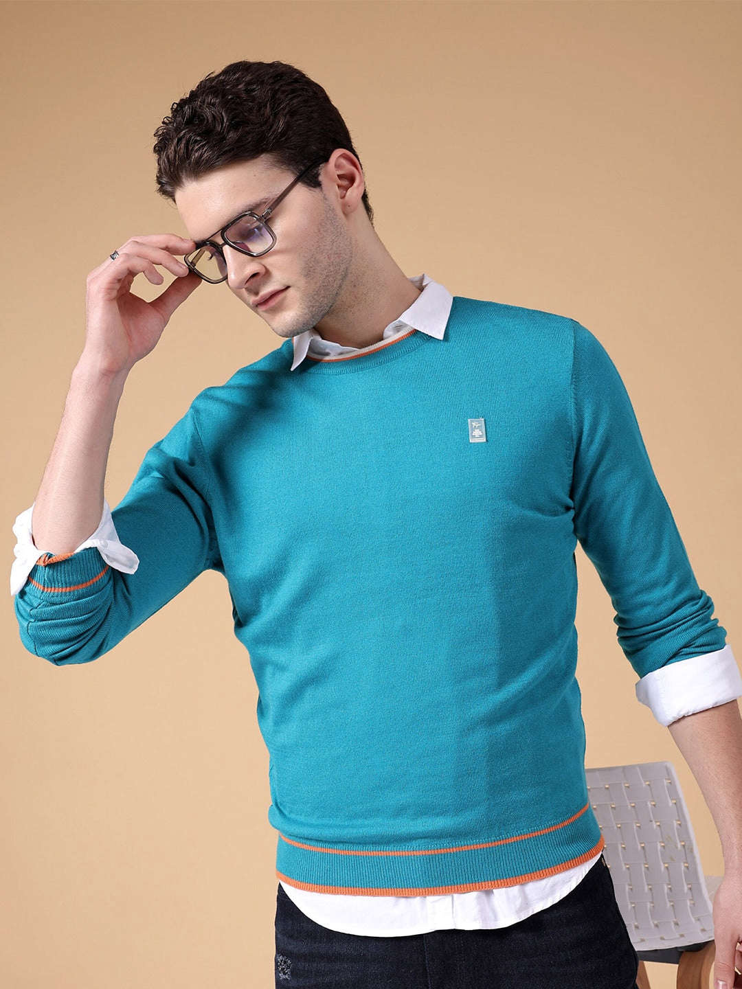 Shop Men's Solid Regular Fit Sweater Online.