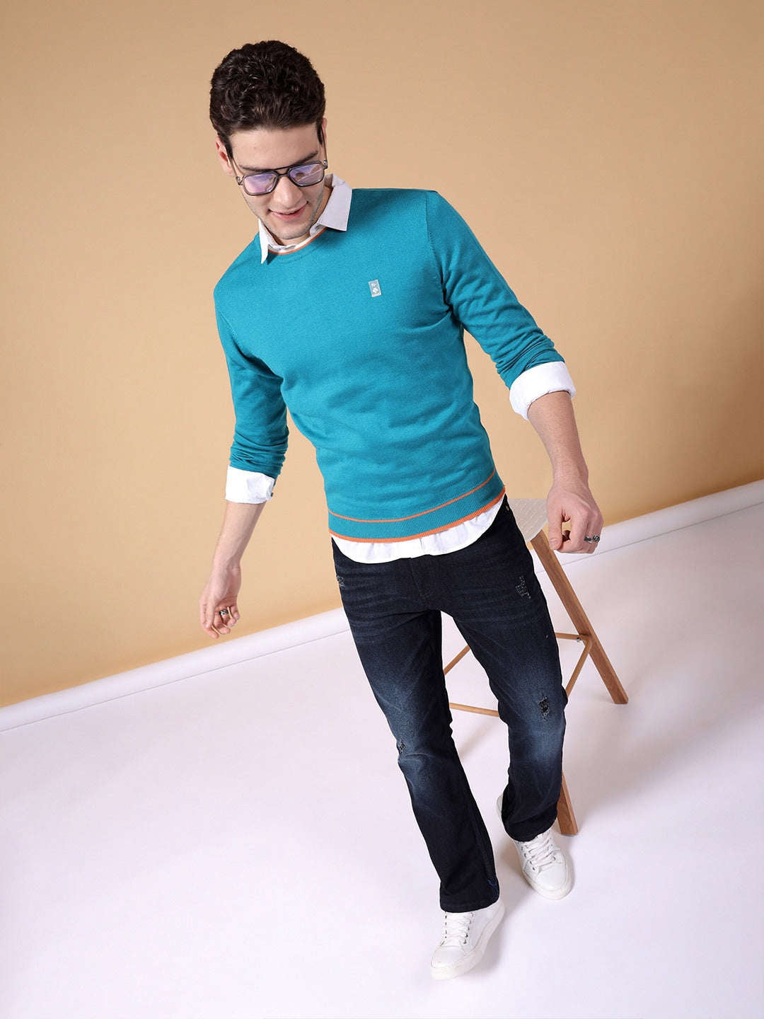 Shop Men's Solid Regular Fit Sweater Online.