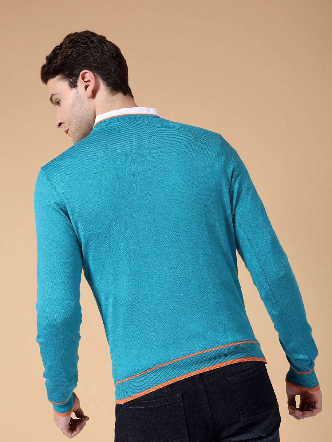 Shop Men's Solid Regular Fit Sweater Online.