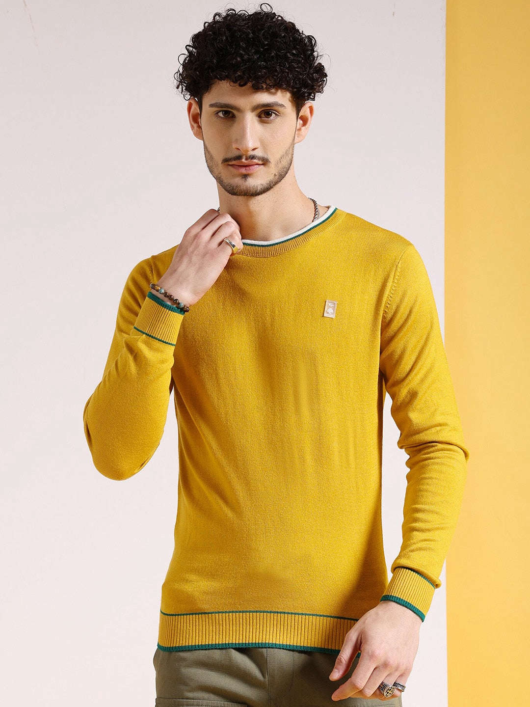 Shop Men's Solid Regular Fit Sweater Online.