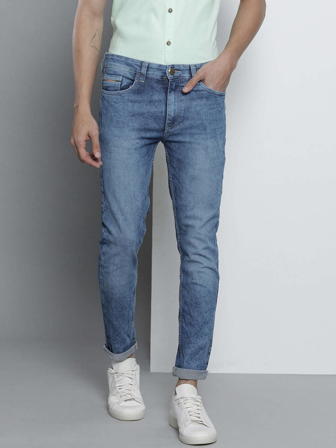 Shop Men Solid Slim Fit Jeans Online.