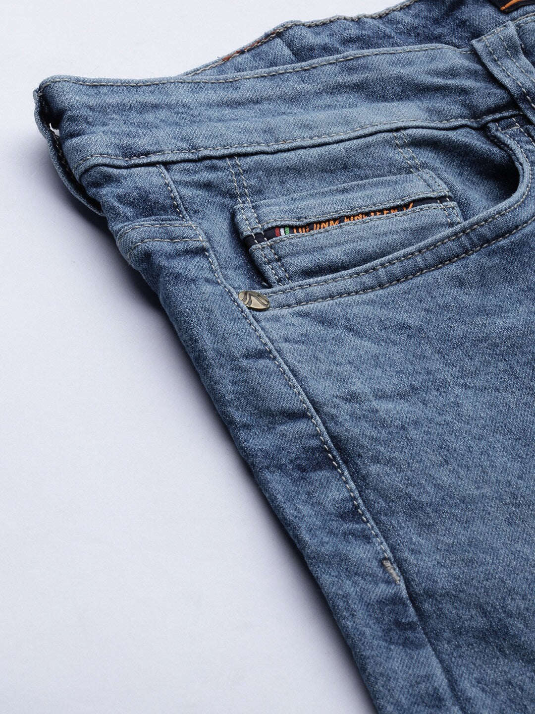 Shop Men Solid Slim Fit Jeans Online.