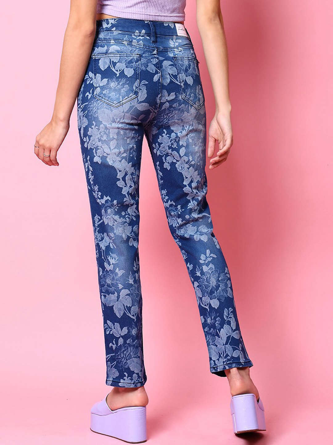 Shop Women Animal Printed Straight Denim Jeans Online.