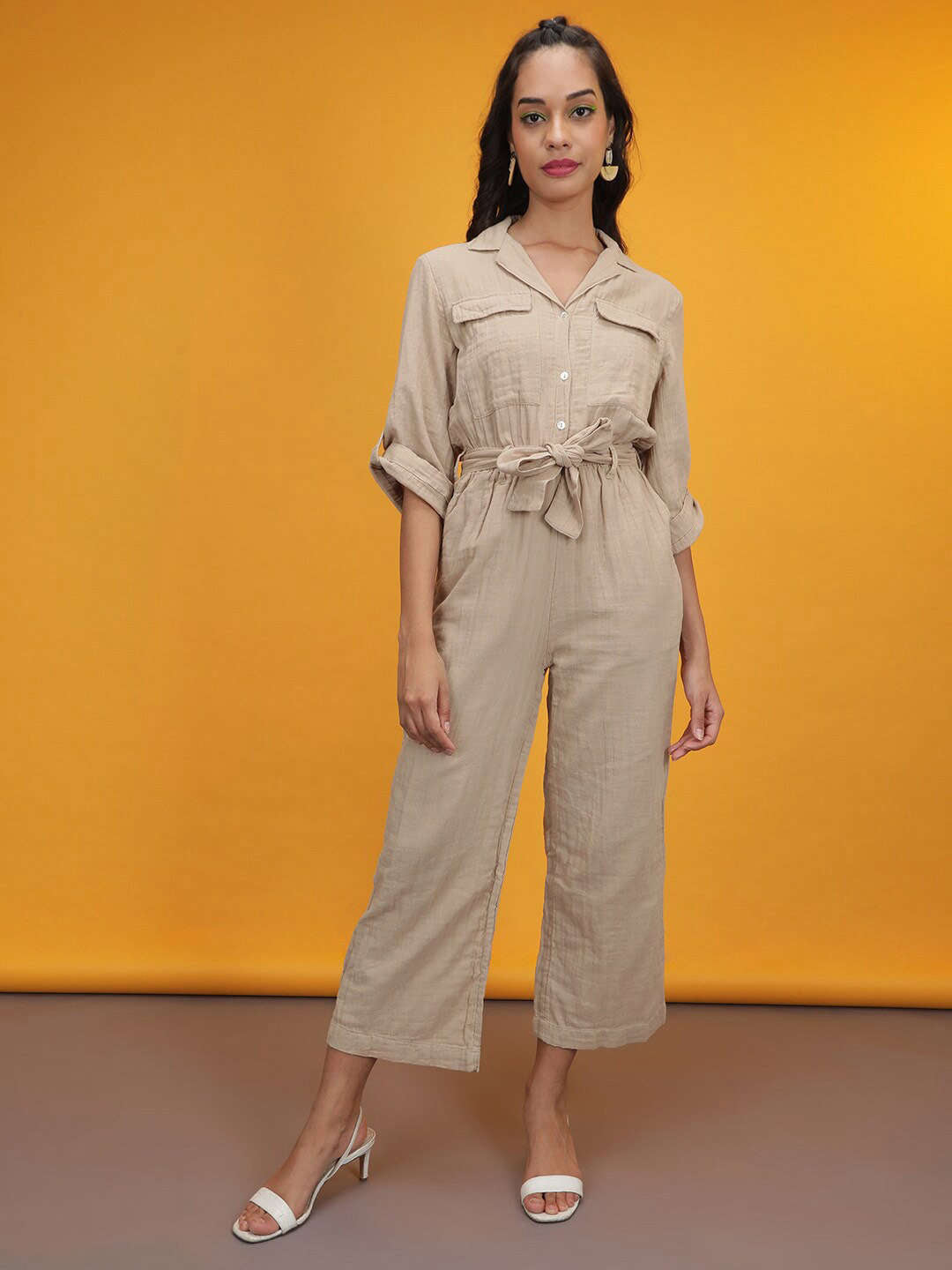 Shop Women Solid Jumpsuit With Flap Pockets Online.