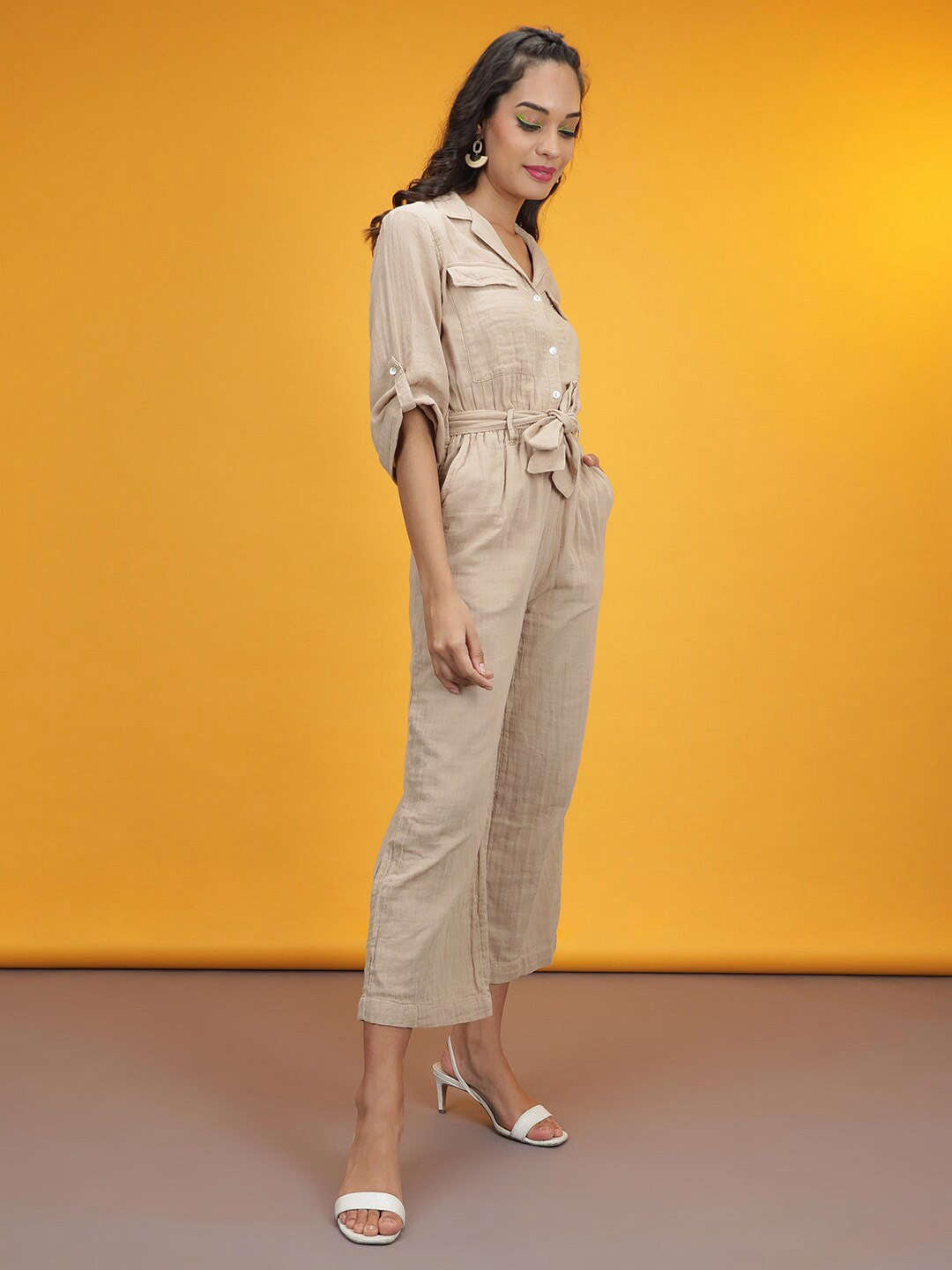 Shop Women Solid Jumpsuit With Flap Pockets Online.