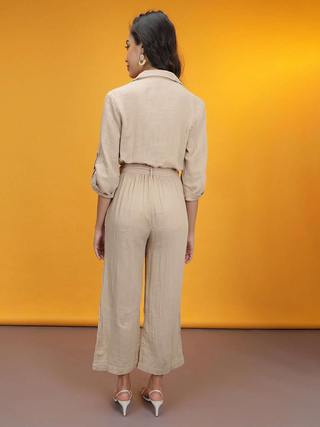 Shop Women Solid Jumpsuit With Flap Pockets Online.