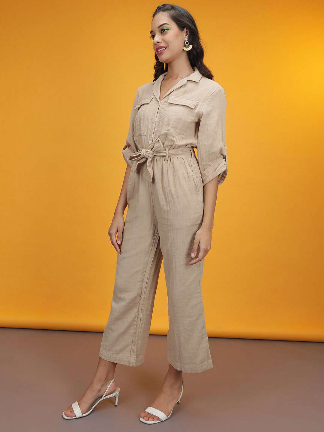 Shop Women Solid Jumpsuit With Flap Pockets Online.