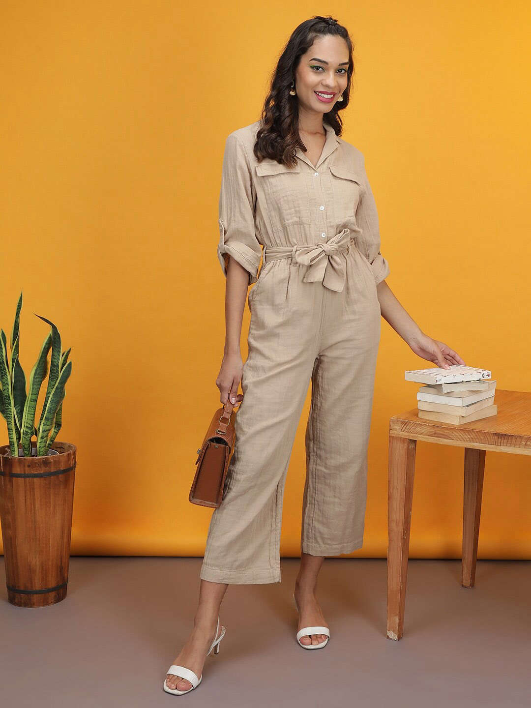 Shop Women Solid Jumpsuit With Flap Pockets Online.