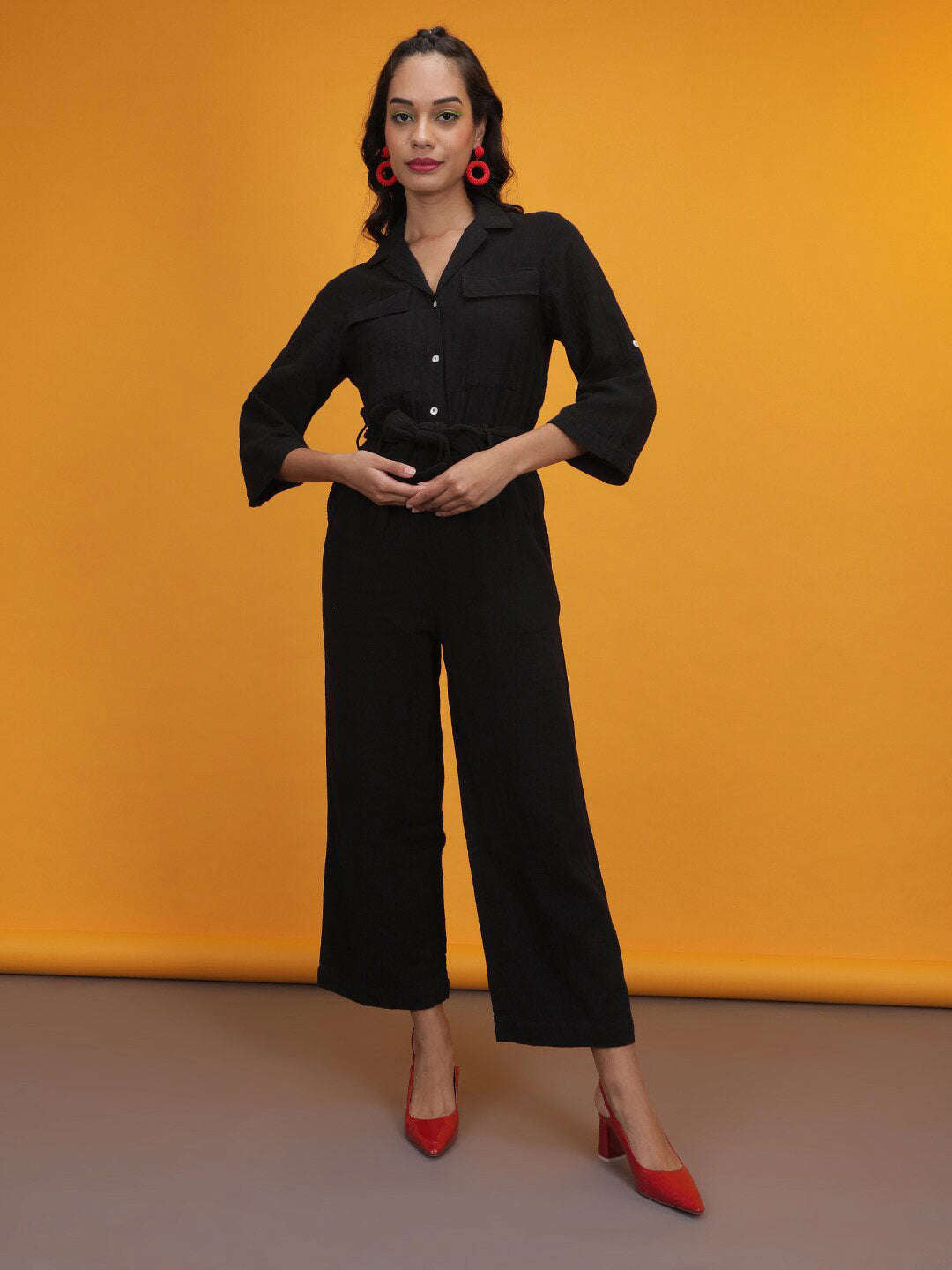 Shop Women Solid Jumpsuit With Flap Pockets Online.