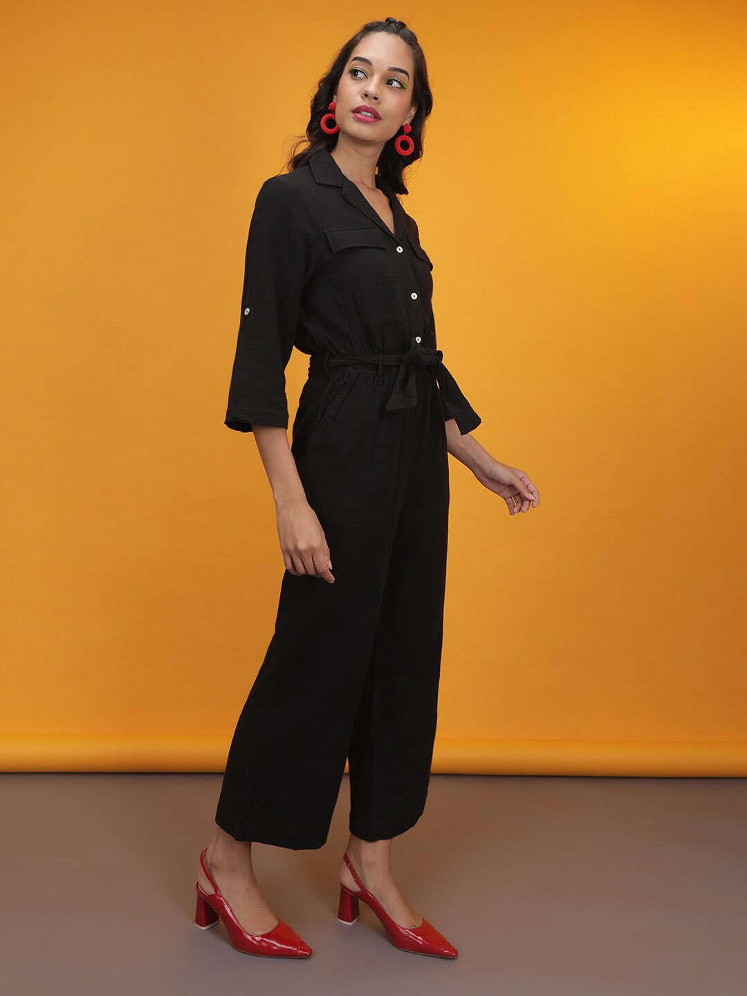 Shop Women Solid Jumpsuit With Flap Pockets Online.