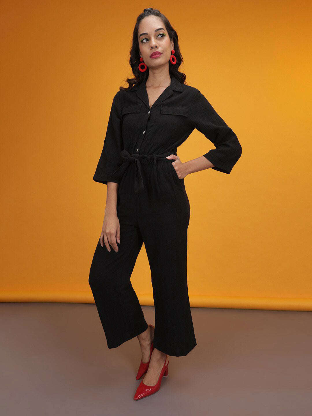 Shop Women Solid Jumpsuit With Flap Pockets Online.