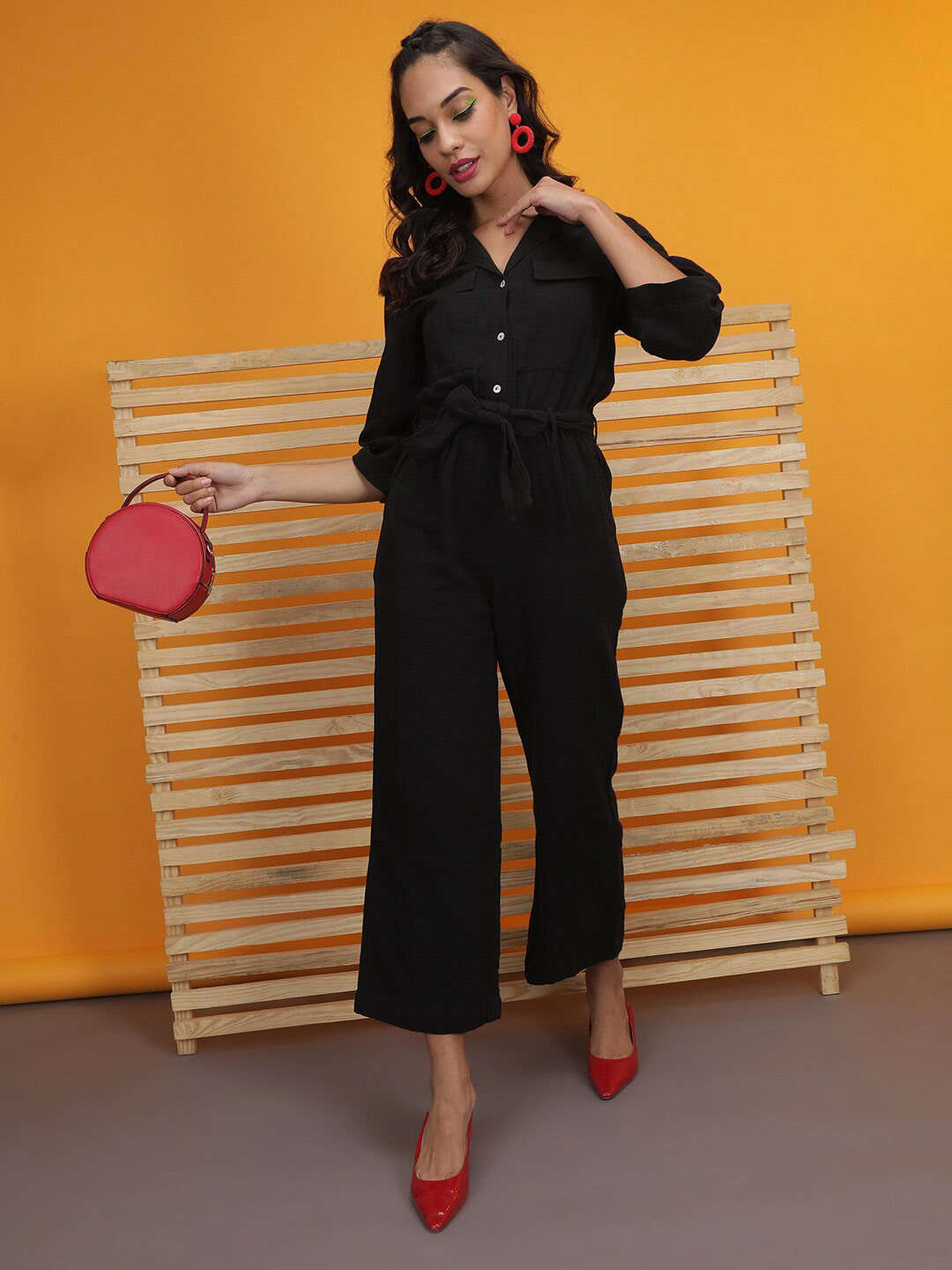 Shop Women Solid Jumpsuit With Flap Pockets Online.