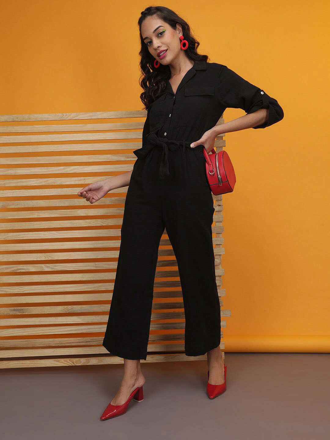 Shop Women Solid Jumpsuit With Flap Pockets Online.