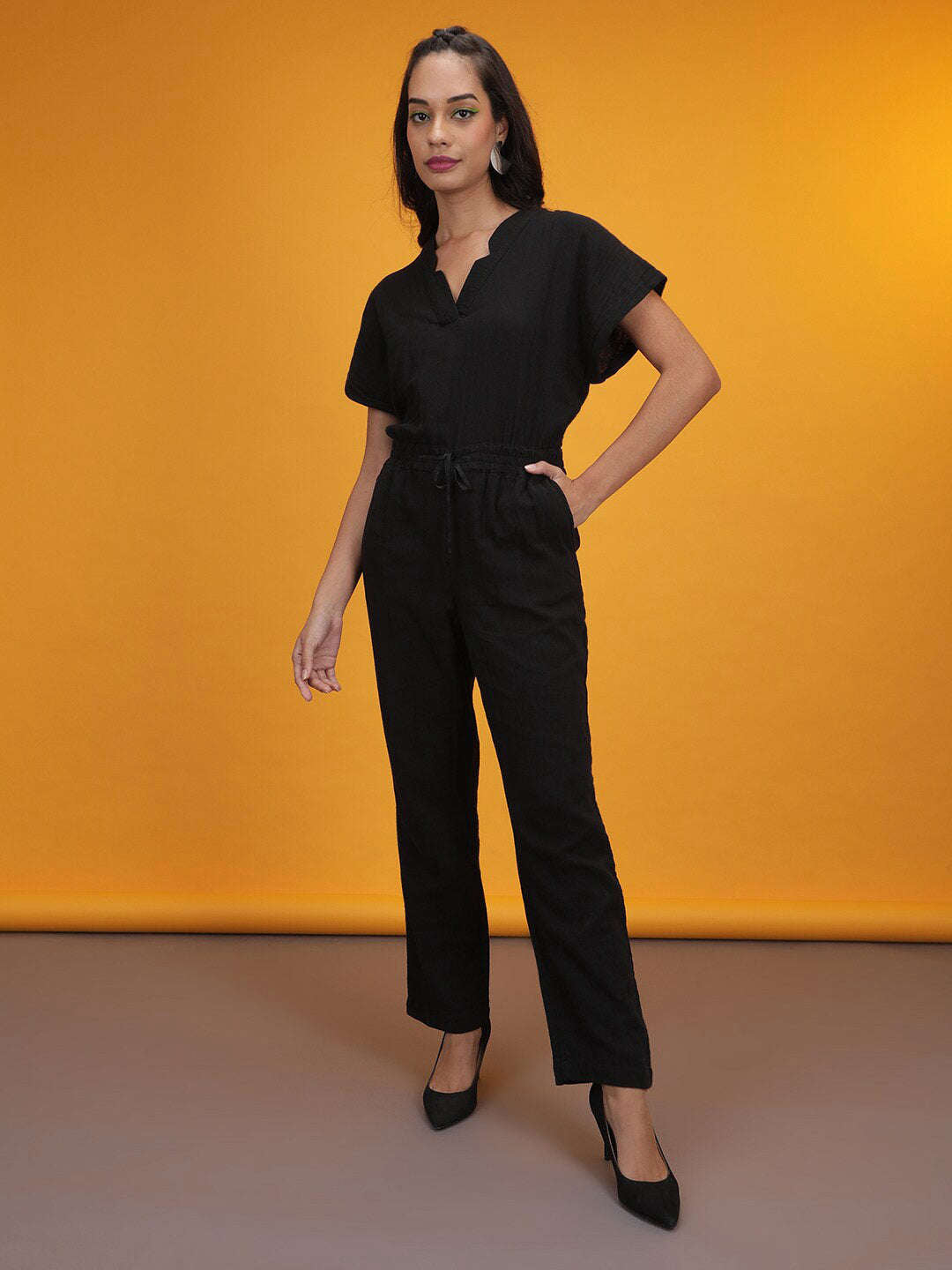 Shop Women Solid Jumpsuit With Scoop Pockets Online.