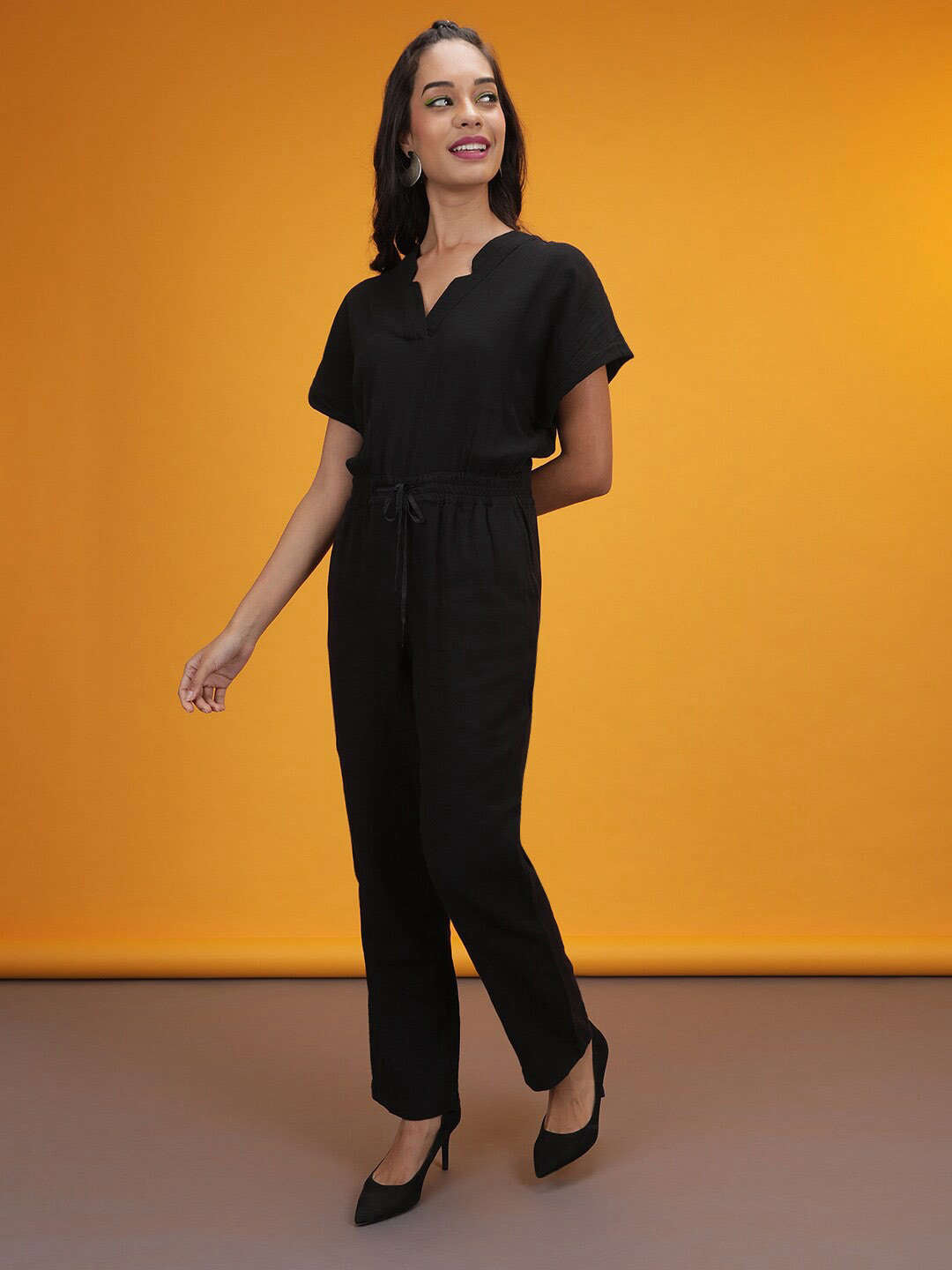 Shop Women Solid Jumpsuit With Scoop Pockets Online.