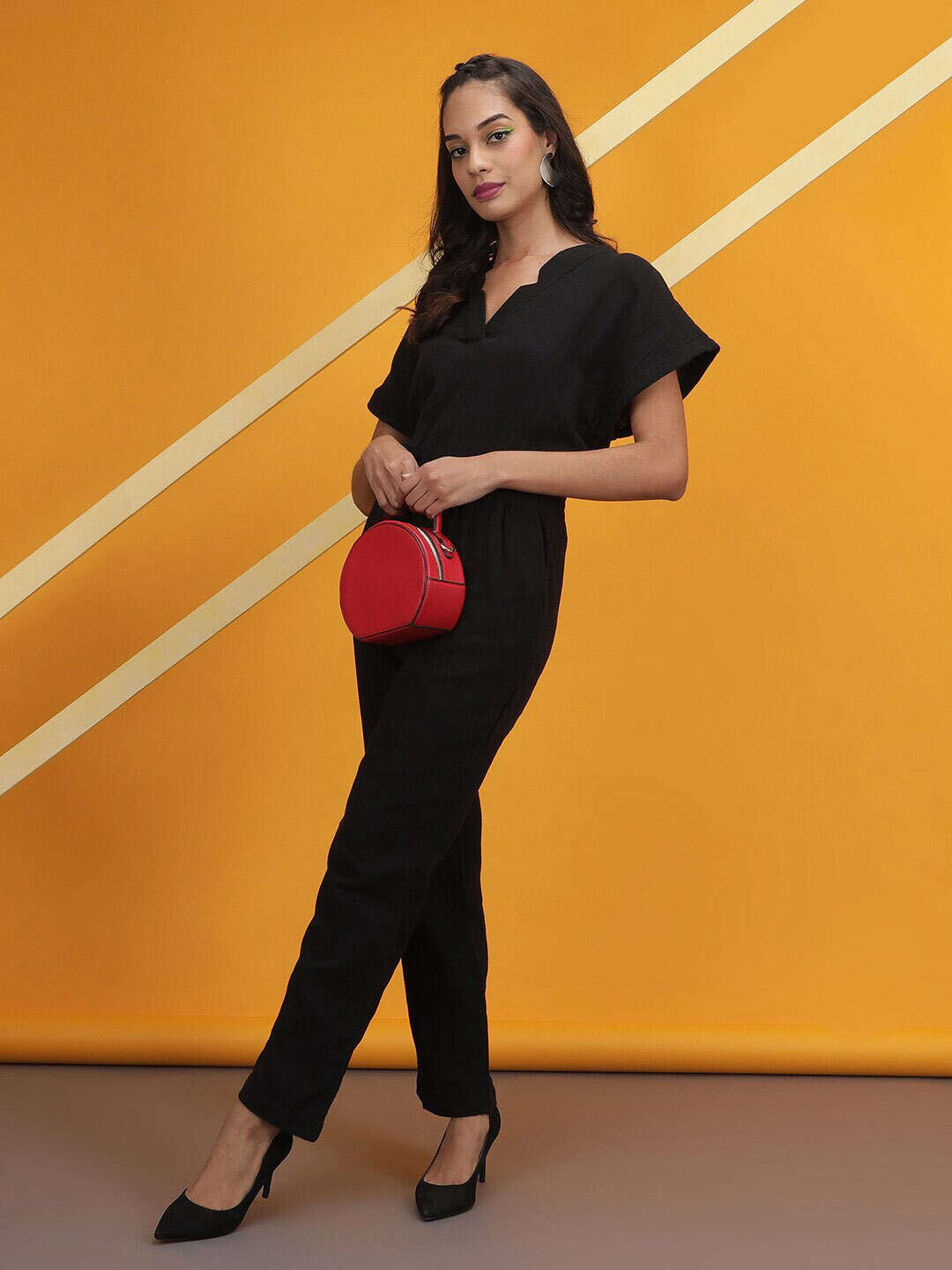 Shop Women Solid Jumpsuit With Scoop Pockets Online.