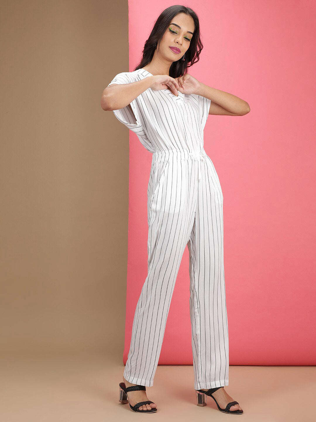 Shop Women Solid Jumpsuit With Scoop Pockets Online.