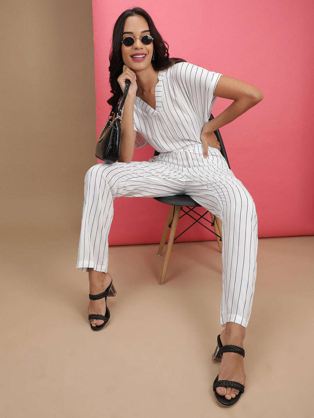 Shop Women Solid Jumpsuit With Scoop Pockets Online.