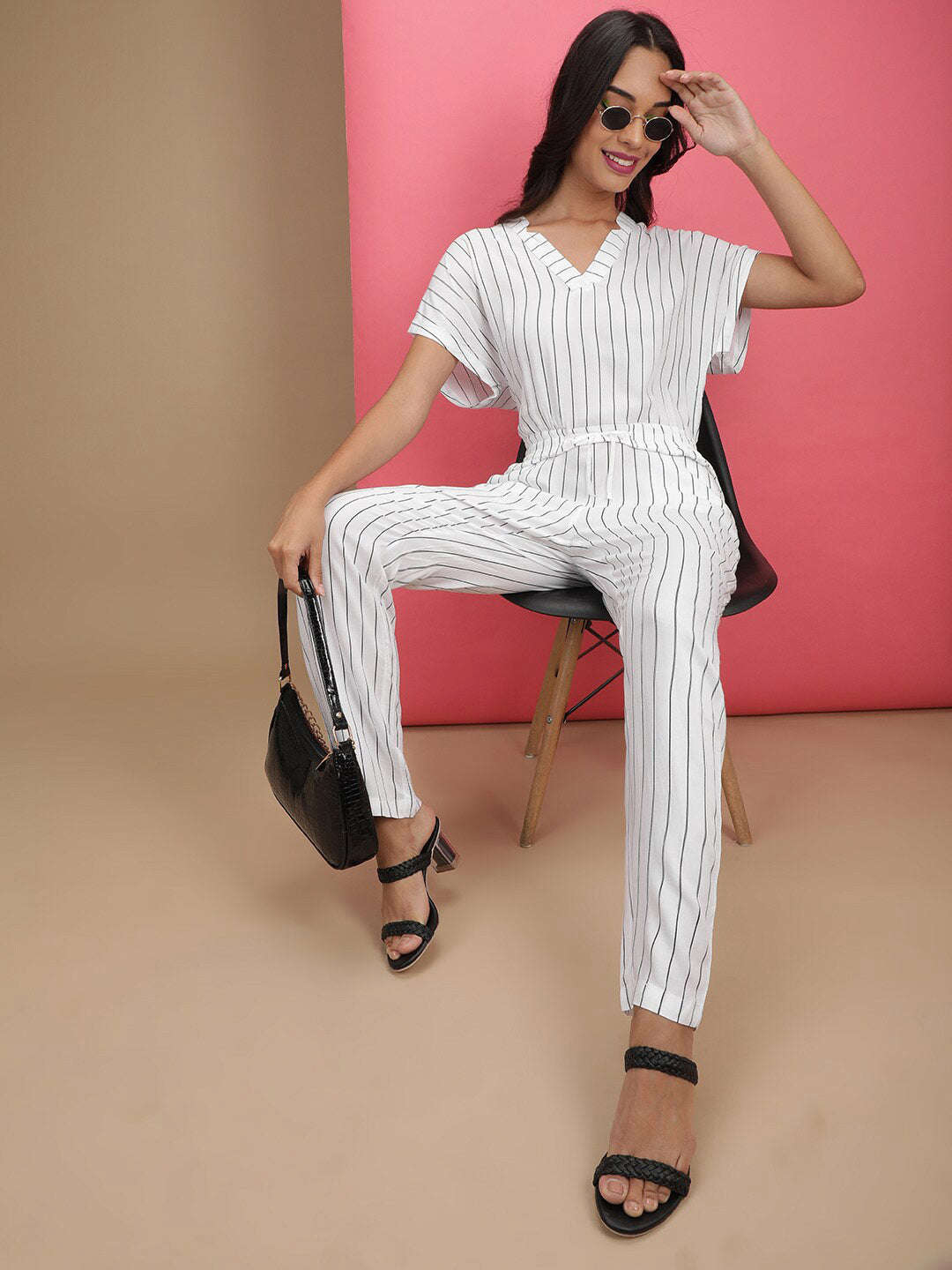 Shop Women Solid Jumpsuit With Scoop Pockets Online.