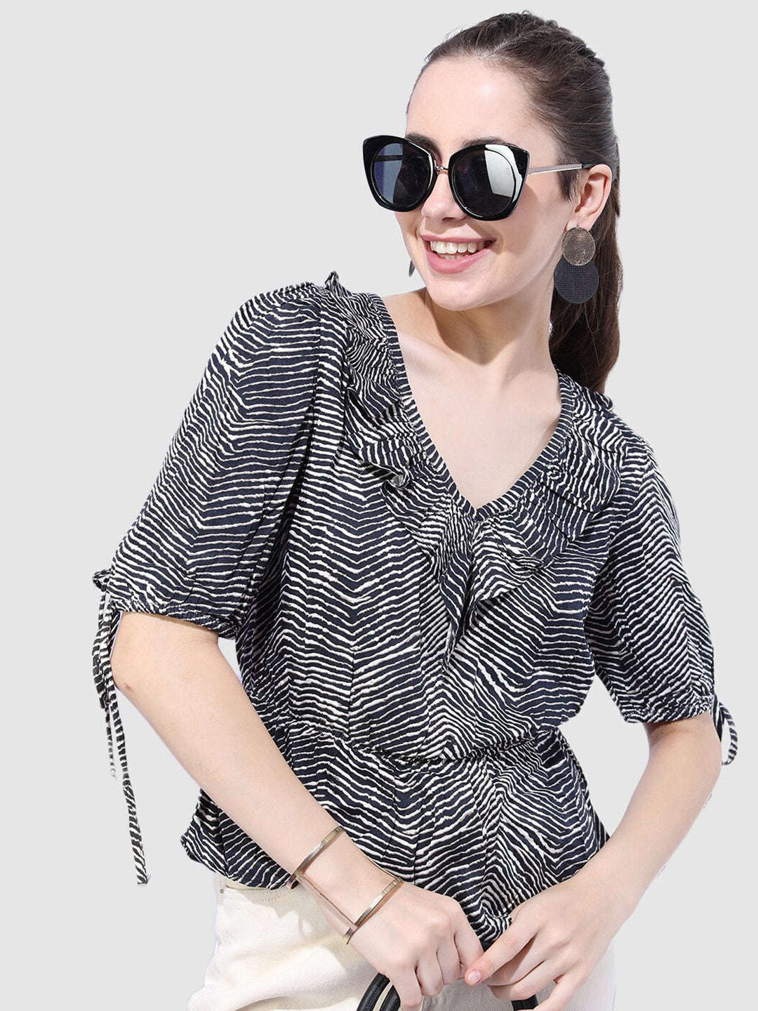 Shop Women Printed Top With Sleeve Tie Up Online.