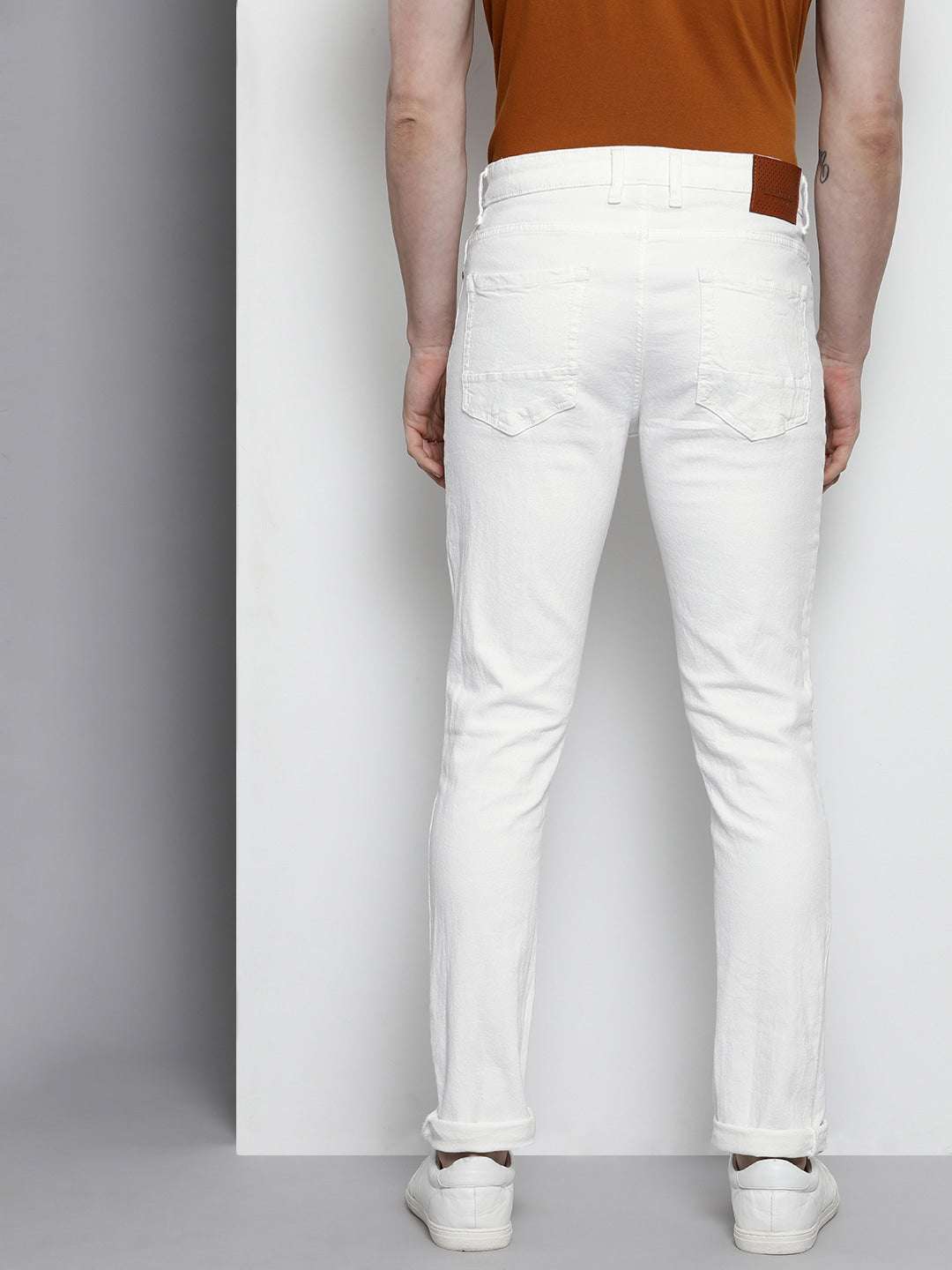 Shop Men Solid Jeans Online.