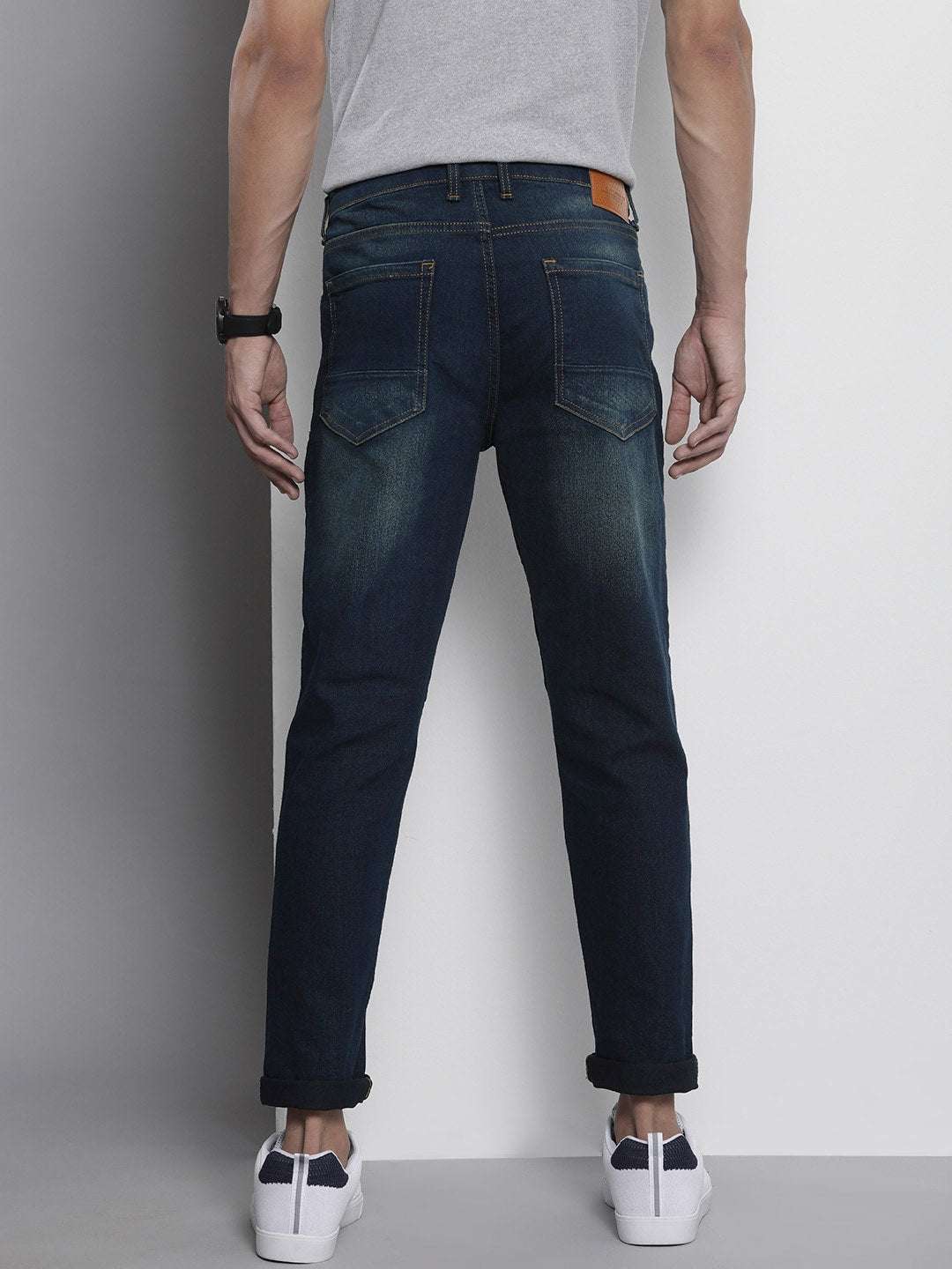 Shop Men Distress Carrot Fit Jeans Online.