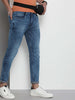 Shop Men Distress Carrot Fit Jeans Online.