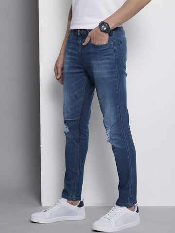 Shop Men Distress Carrot Fit Jeans Online.