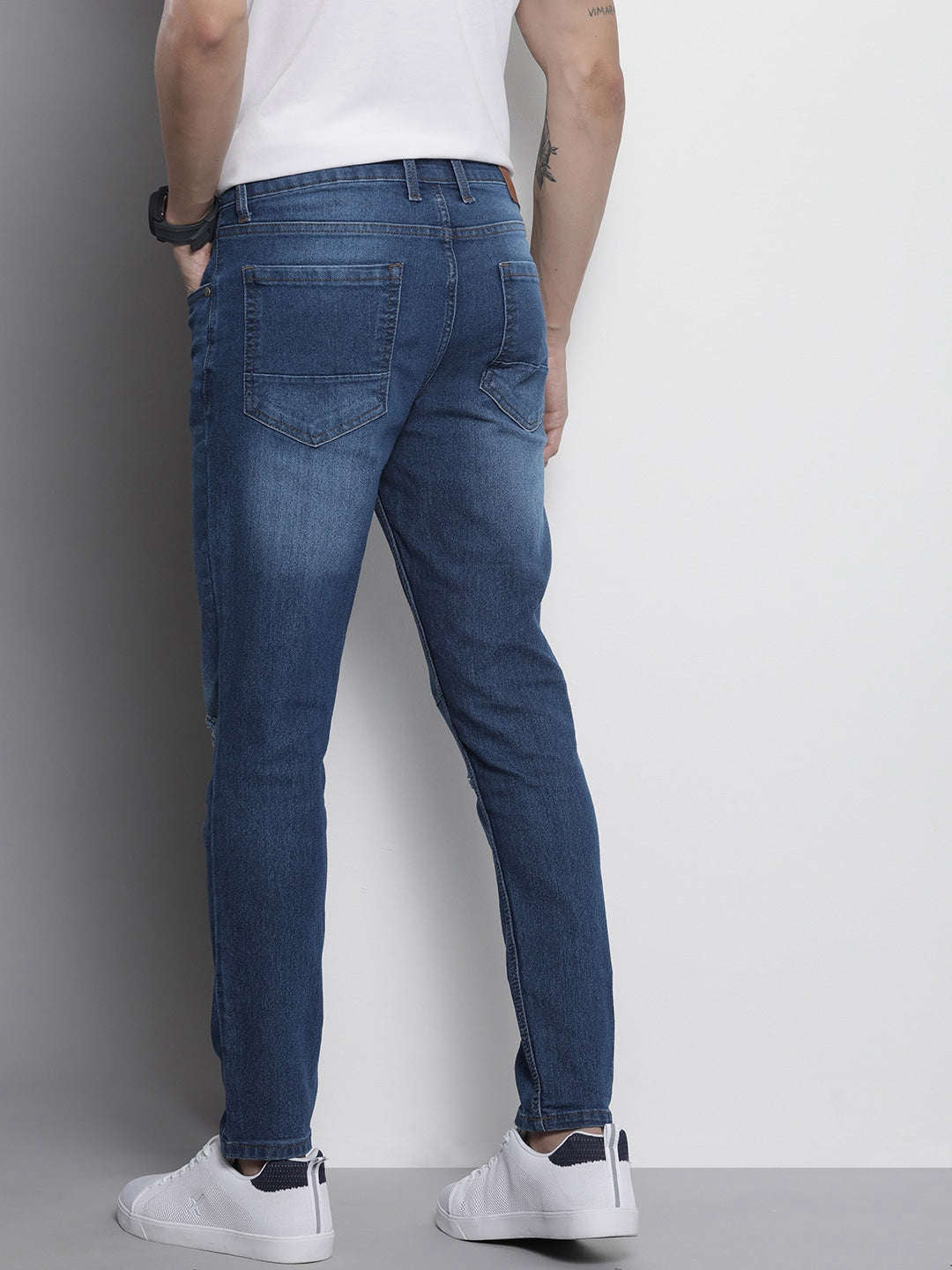 Shop Men Distress Carrot Fit Jeans Online.