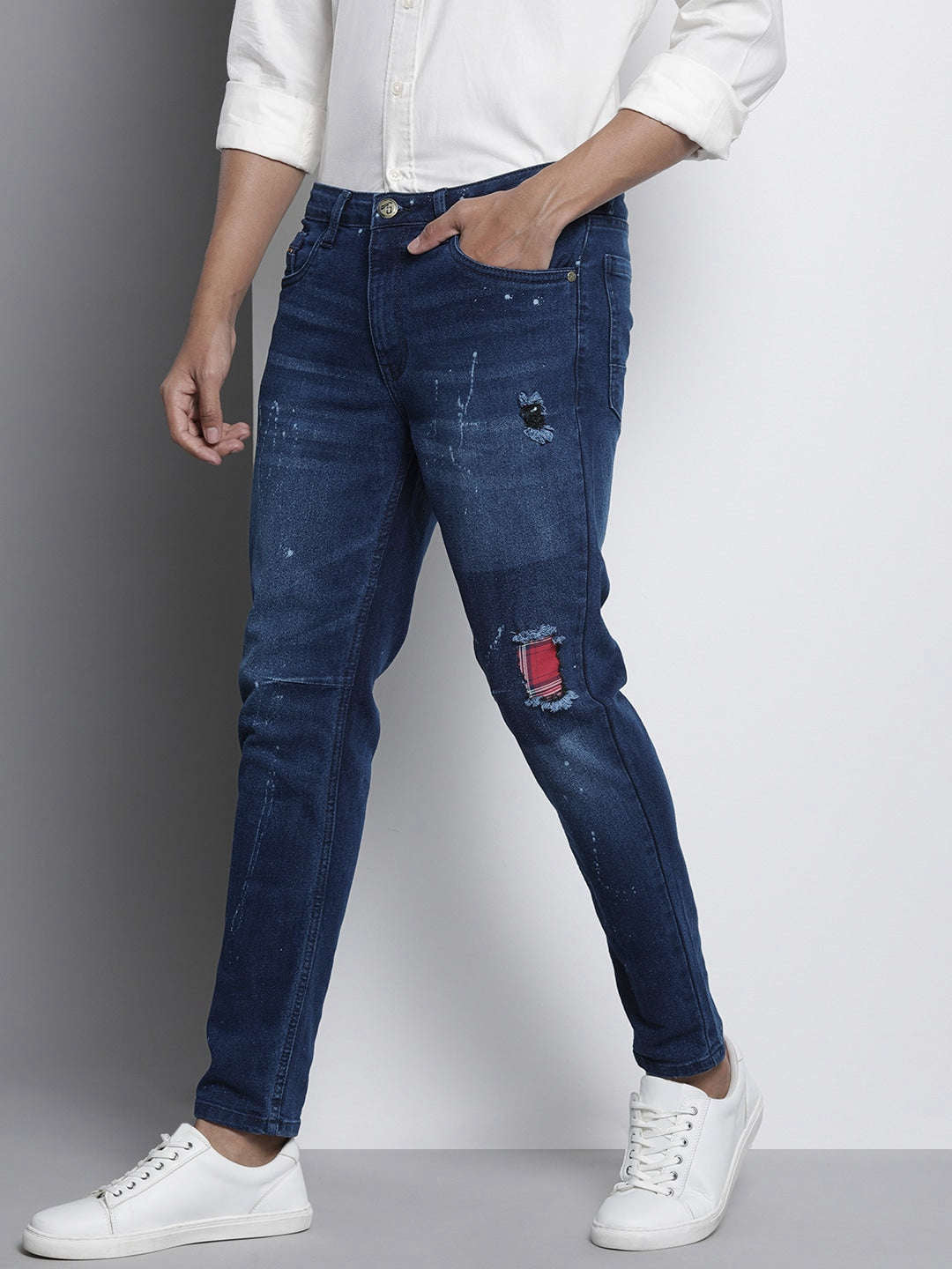 Shop Men Distress Carrot Fit Jeans Online.